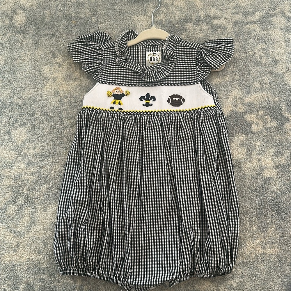 New Orleans Saints 18 month girl smocked bubble. Good condition.